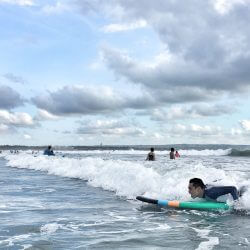 Enjoy surfing in the sea and the fun night in Kuta